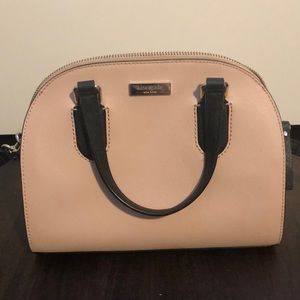 Kate spade pink purse with adjustable strap.